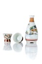 Set Ceramic bottles and cup Japanese style sake oriental drink, front view, and reflection isolated on a white background are