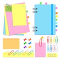 A set of chancery. Closed notebook on a spiral, sticky sheets of different shapes and colors, bookmarks, pins, clips, staples.