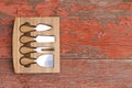 Set of cheese cutters in a fitted wooden block Royalty Free Stock Photo