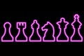 Set of chess figures on black background. Simple neon pink outline. Vector illustration Royalty Free Stock Photo