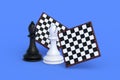 Set of chess figures near chess board on blue background Royalty Free Stock Photo