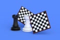 Set of chess figures near chess board on blue background Royalty Free Stock Photo
