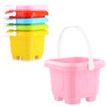 A set of children's plastic buckets isolated on a white background. Toys for playing in the sandbox or on the beach Royalty Free Stock Photo
