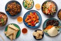 Set of Chinese dishes on white table Royalty Free Stock Photo