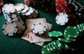 Set of chips and cards on a green baize gambling casino Royalty Free Stock Photo