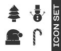 Set Christmas candy cane with stripes, Christmas tree, Christmas Santa Claus hat and Christmas snowman icon. Vector Royalty Free Stock Photo