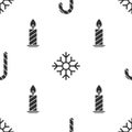 Set Christmas candy cane with stripes, Snowflake and Burning candle in candlestick on seamless pattern. Vector Royalty Free Stock Photo