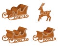 Isolated gingerbread sledges and reindeer.