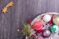 Set of Christmas decorations in wooden tray on grunge background. Holiday concept. Flat lay, top view Royalty Free Stock Photo