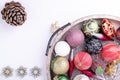 Set of Christmas decorations in wooden tray on white background. Holiday concept. Flat lay, top view Royalty Free Stock Photo