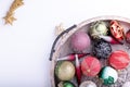 Set of Christmas decorations in wooden tray on white background. Holiday concept. Flat lay, top view Royalty Free Stock Photo