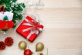 Set of Christmas decorative items red and gold shiny glossy sphere balls Candles Present gift box with silver ribbon bowtie Light Royalty Free Stock Photo