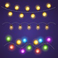 Set of Christmas glowing garlands of light bulbs on a blue background.