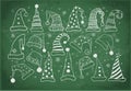 Set of Christmas hats on blackboard background. Vector illustration. Royalty Free Stock Photo