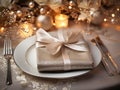 set of Christmas laid table, golden napkin ,luxurious plates, silver cutlery, Christmas dinner or New Year\'s Eve party Royalty Free Stock Photo
