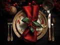 set of Christmas laid table, red napkin and luxurious plates, silver cutlery, Christmas dinner or New Year\'s Eve party Royalty Free Stock Photo