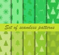 Set of Christmas seamless patterns. Fir trees and celebratory symbols. Ten winter backgrounds. Vector Royalty Free Stock Photo