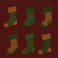 Set of Christmas socks with different patterns in orange and green colors
