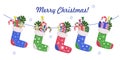 A set of Christmas socks with gifts, sweets and sweets. Colorful socks with snowflakes ornament for home or fireplace decoration,