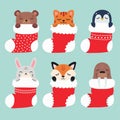 Set of Christmas stockings. Animals sleep in Christmas stockings. Christmas gift. Royalty Free Stock Photo