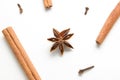 Set of cinnamon, clove and star anise, scattered in a chaotic manner, isolated on white background Royalty Free Stock Photo