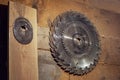 set of circular saw blades hangs on wooden wall in the carpentry workshop. Circular saw. old rustic carpentry workshop Royalty Free Stock Photo