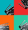 Set with clapperboards on different color backgrounds, top view