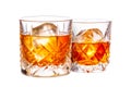 Set of classic Old Fashioned cocktails in a crystal-cut rocks glass isolated on white backdrop Royalty Free Stock Photo