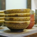 Set of clay cups in tea store. Shop of traditional tea crockery