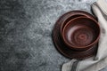 Set of clay dishes on grey table, flat lay. Space for text Royalty Free Stock Photo