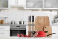 Set of clean cookware and utensils in kitchen. Space for text Royalty Free Stock Photo