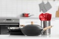 Set of clean cookware and utensils on table in kitchen Royalty Free Stock Photo