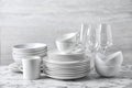 Set of clean dishware on marble table Royalty Free Stock Photo