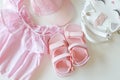 Set of clothes for a little girl, sandals, bag, cap, flat lay top view Royalty Free Stock Photo
