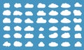 Set of clouds in blue sky. Cloud icon shape. Collection of different clouds, label, symbol. Graphic vector design element for logo Royalty Free Stock Photo