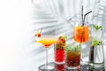 Set cocktails on marble table and light background banner. five kinds of colorful summer cocktails in glasses and shadow of tropic Royalty Free Stock Photo