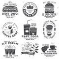 Set of Coffe shop and fast food retro badge template. Vector Typography design with paper coffee cup, branch of coffee Royalty Free Stock Photo