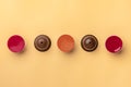 Set of coffee capsules isolated on beige background