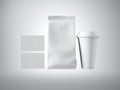 Set of coffee package, take away cup and two blank business cards. White background. 3d render Royalty Free Stock Photo