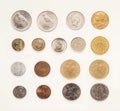 Set of coins of different countries on white