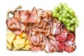 Set of cold cured italian meat Ham, prosciutto, pancetta, bacon with parmesan and grape. Isolated on white background