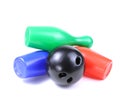 Set of collored bowling pins and ball isolated on a white background. Skittles isolated on a white background