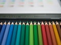 Assorted color pencils, crayons, in a metal box Royalty Free Stock Photo