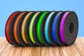 Set of colored 3D printer filaments on the wooden table, 3D rendering