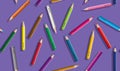 Set of colored pencil collection scattered arranged - seamless vector illustration craynos on violet background. Royalty Free Stock Photo