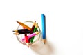 Set of colored pencils for creativity and drawing drawn up in a glass jar and isolated on a white background of a blank Royalty Free Stock Photo