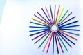 Set of colored pencils lie in a circle top view Royalty Free Stock Photo