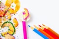 Set of colored pencils, sharpener and shavings Royalty Free Stock Photo