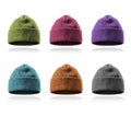 Set of colorful acrylic winter hats isolated on white background Royalty Free Stock Photo