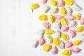 Set of colorful baby dumplings from color dough stuffed with meat on white wooden background